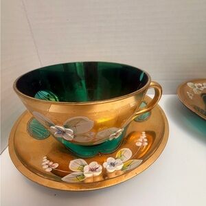 Vintage Czechoslovakian green glass teacup and saucer gold guilt enamel flowers